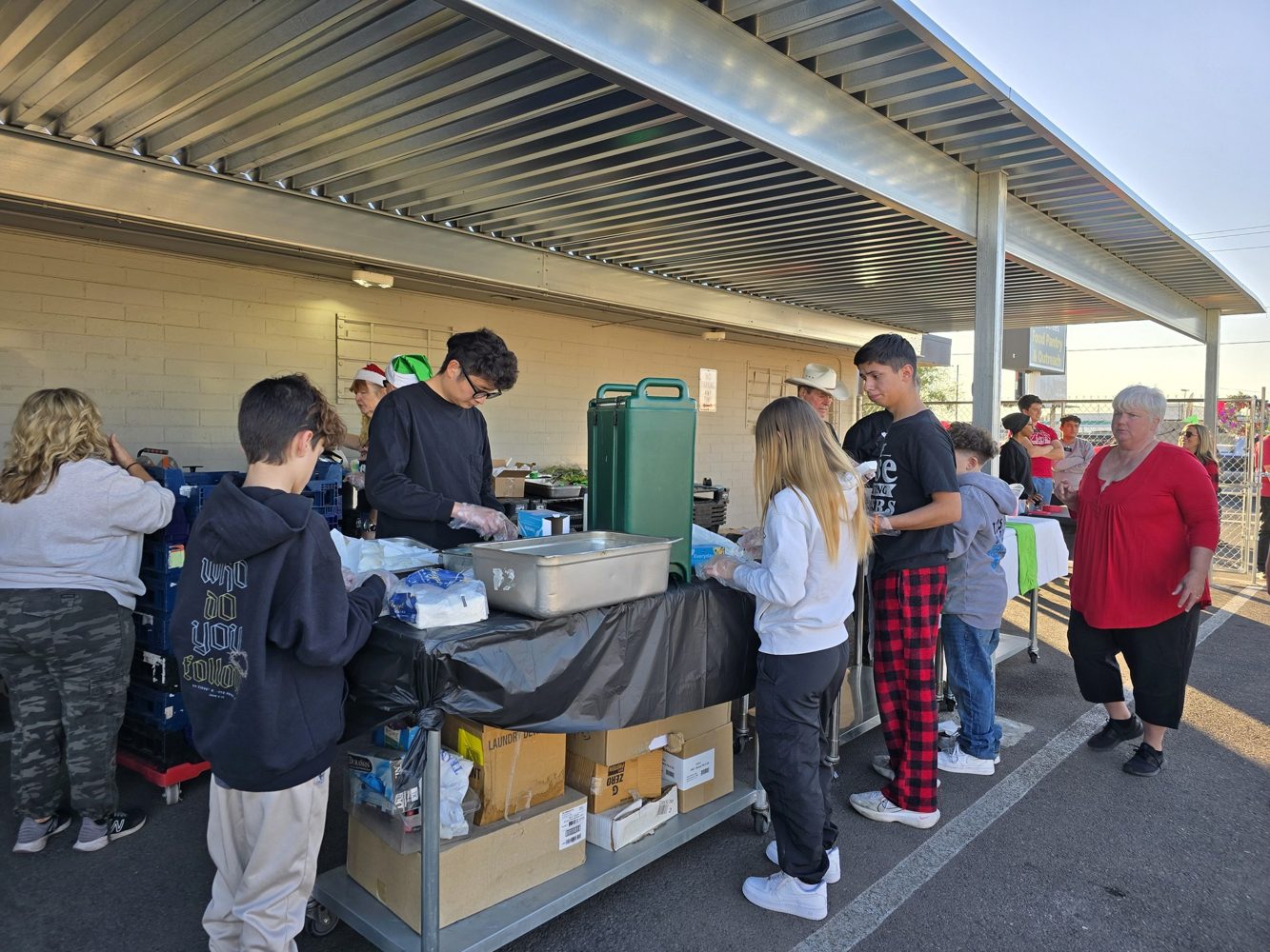 Guests and volunteers at homeless holiday outreach