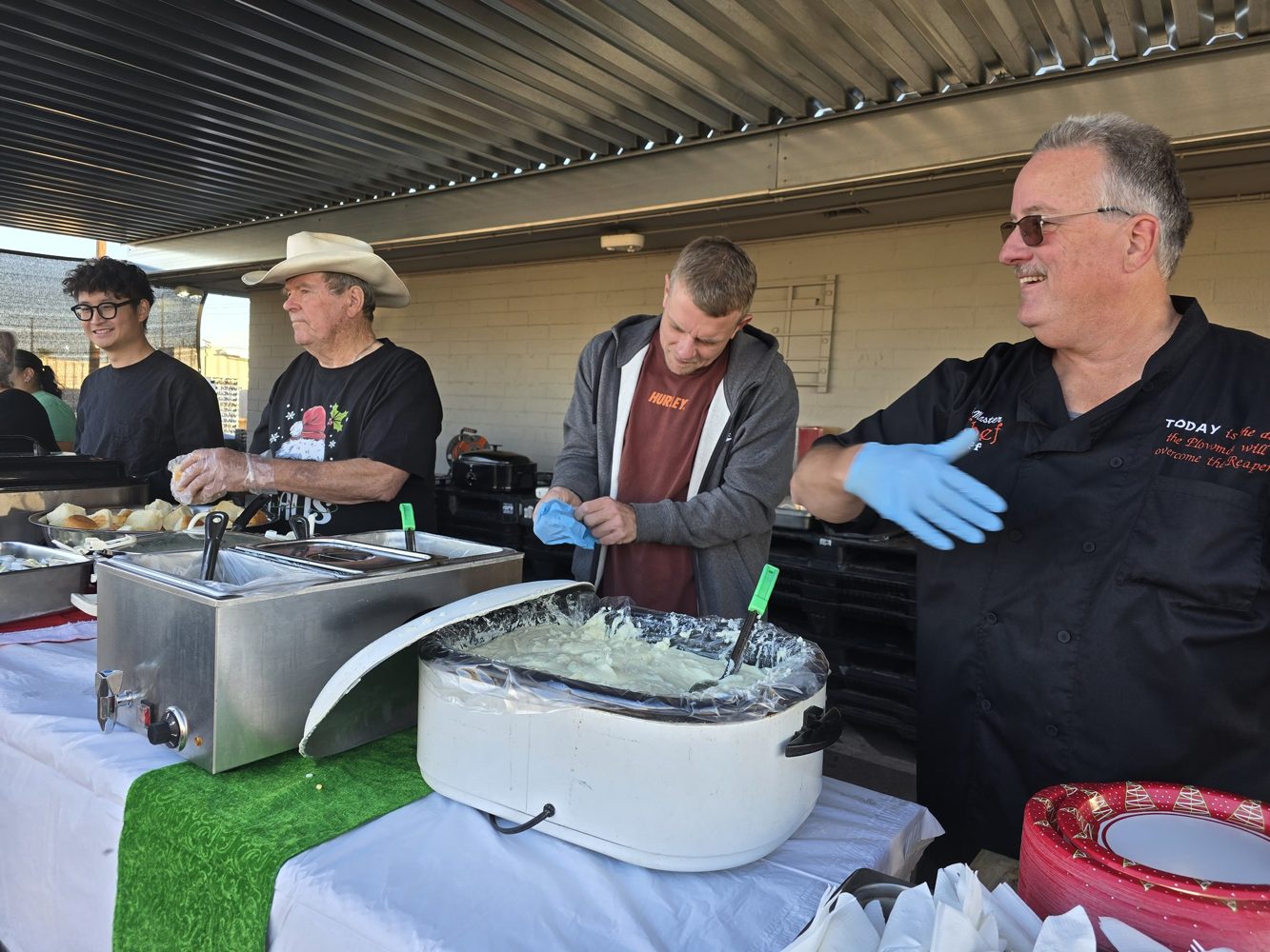 Serving table at community holiday meal